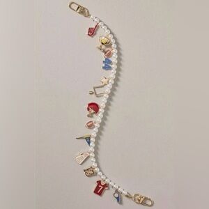 Anthropologie Icon Pearl Bag Charm with football-themed charms!